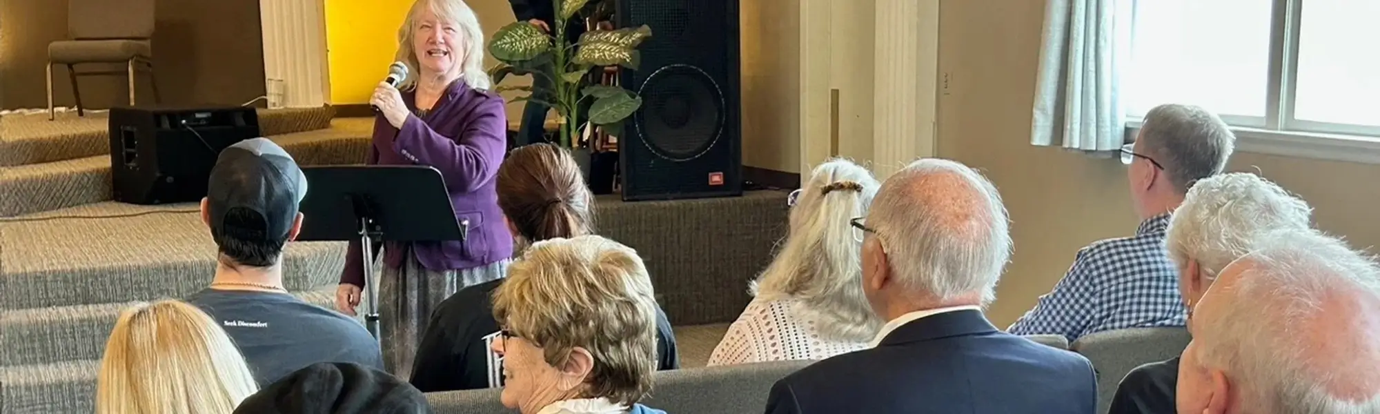 Sandy Stephens Speaking to a Crowd